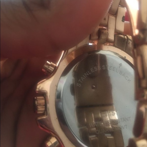 woman’s stainless steel watch - Picture 2 of 3